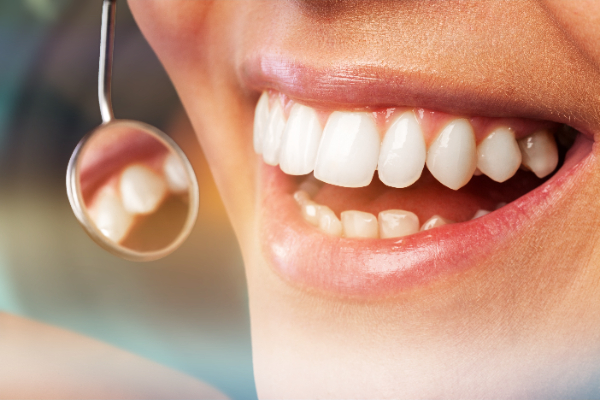 How A Cosmetic Dentist Can Close In Your Teeth